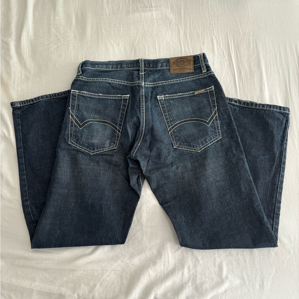 Dark wash dickies jeans with pattern on the pocket